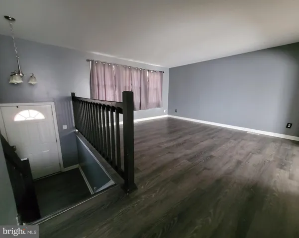 a view of a hallway with entryway