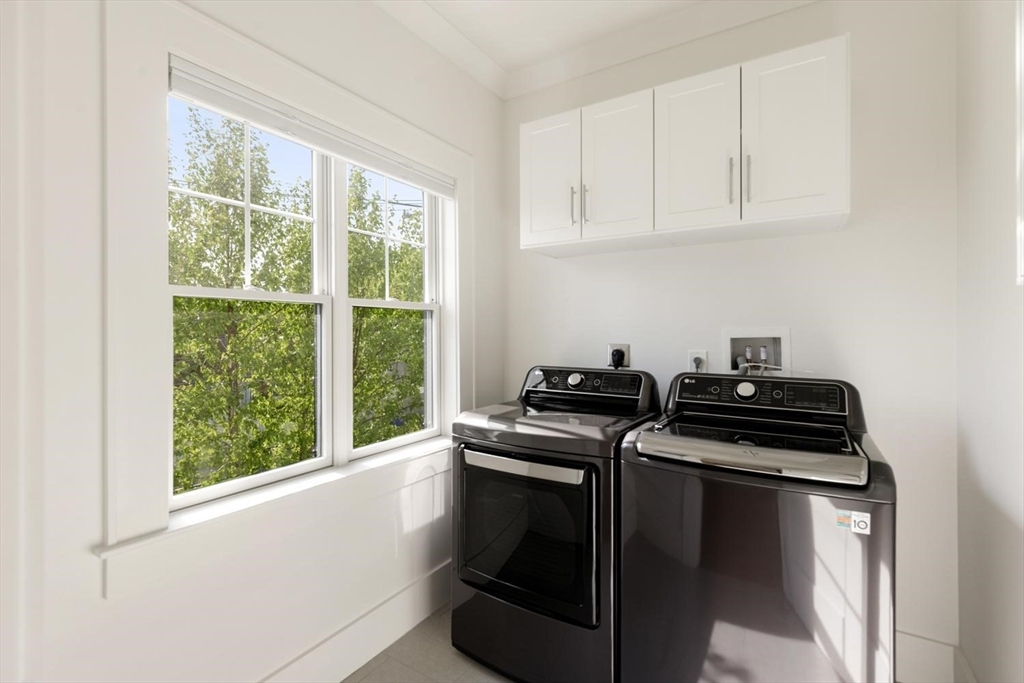 1124 Chestnut Street Newton, MA 02464 - Photo 24 of 41 a kitchen with a stove and a window