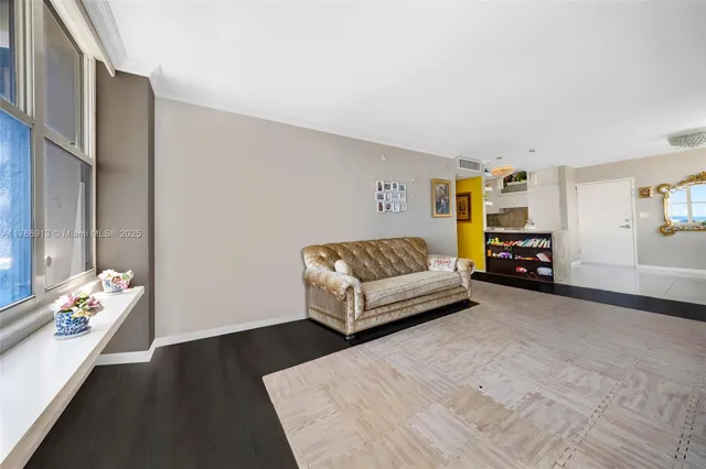 a bathroom with a sink a toilet a mirror and shower