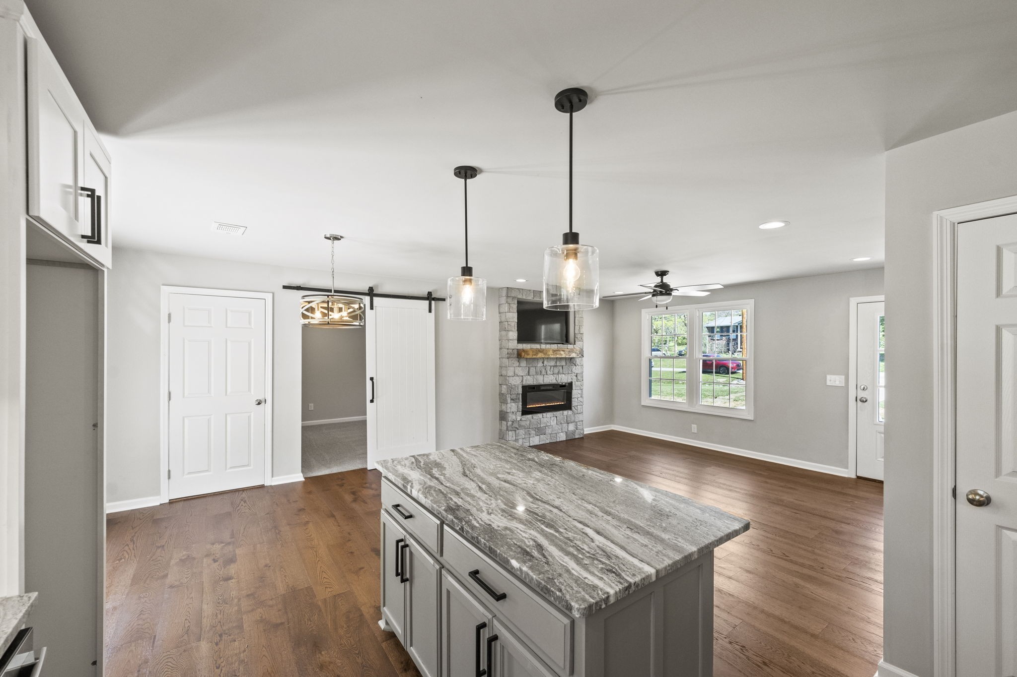 128 South Valley Road Hendersonville, TN 37075 - Photo 16 of 30 a view of an empty room with window and wooden floor