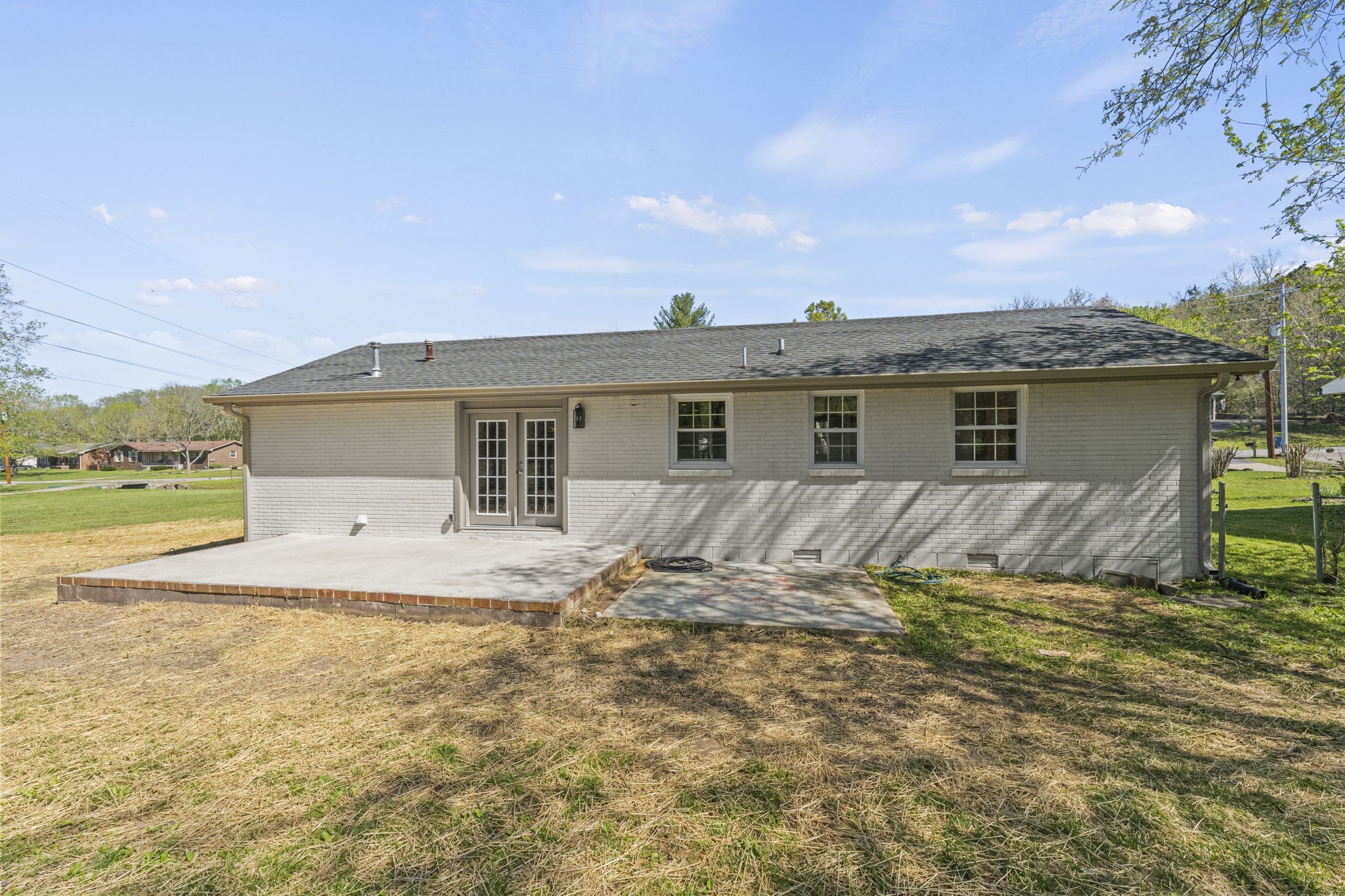 128 South Valley Road Hendersonville, TN 37075 - Photo 30 of 30 a view of a house with backyard and sitting area