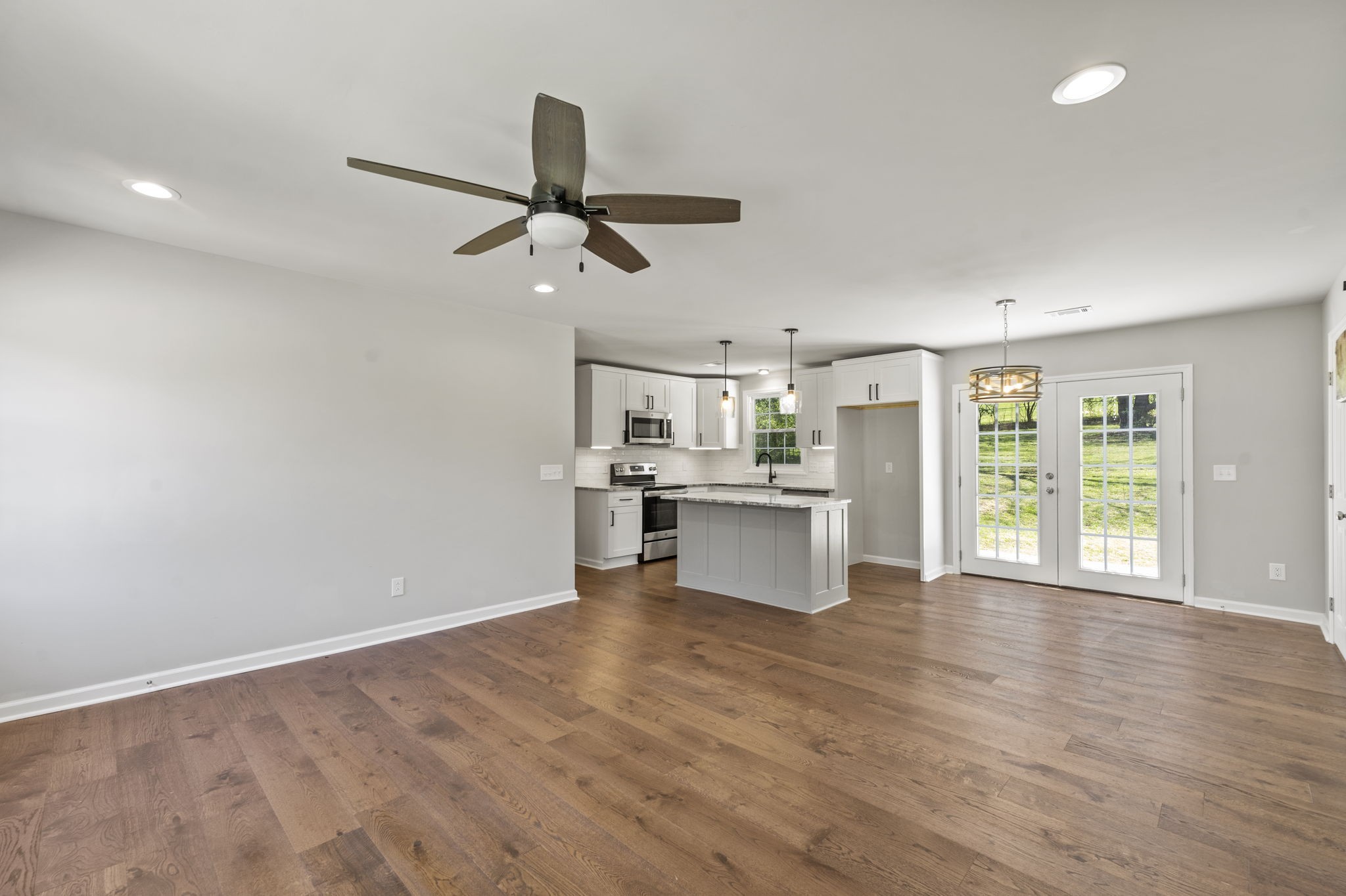 128 South Valley Road Hendersonville, TN 37075 - Photo 9 of 30 a view of a kitchen with wooden floor and window
