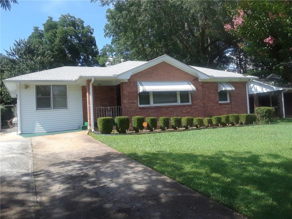 2262 Alpha Drive Decatur, GA 30032 - Photo 1 of 1 a front view of a house with a yard