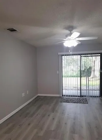 a bathroom with a sink a toilet and vanity