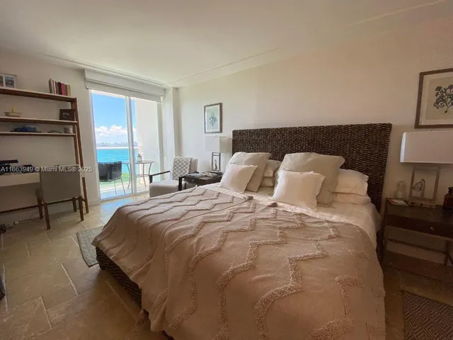 a bedroom with a bed and a closet