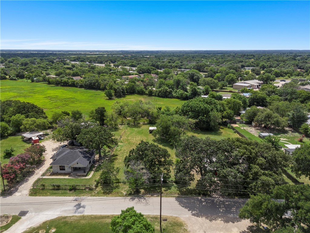 0 Concord Road Waco, TX 76705 - Photo 14 of 16 an aerial view of green landscape with trees houses and mountain view