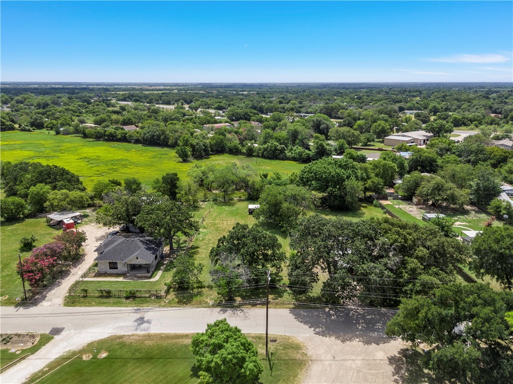 0 Concord Road Waco, TX 76705 - Photo 16 of 16 a view of a lush green outdoor space with a lake view