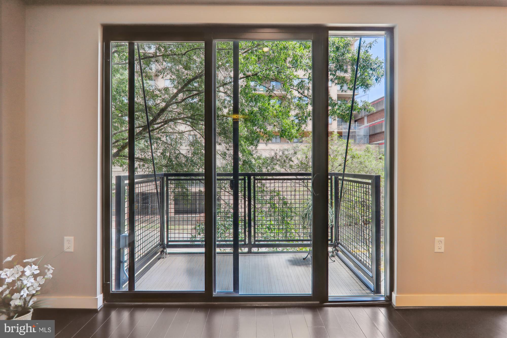 1320 Fenwick Lane, Unit 312 Silver Spring, MD 20910 - Photo 15 of 44 a view of a living room and floor to ceiling window