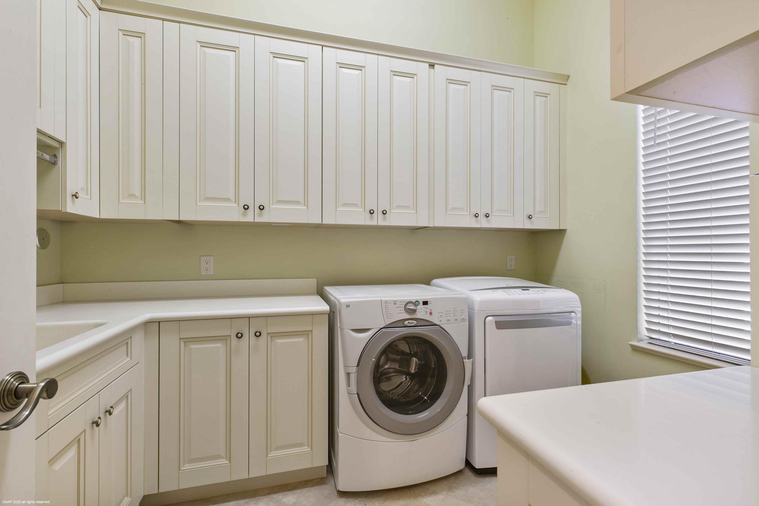 127 Playa Rienta Palm Beach Gardens, FL 33418 - Photo 48 of 51 Laundry Room