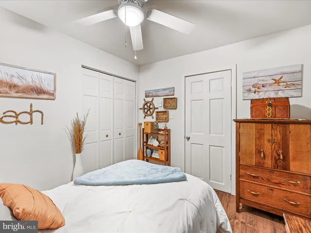 a bedroom with a bed and a cabinets