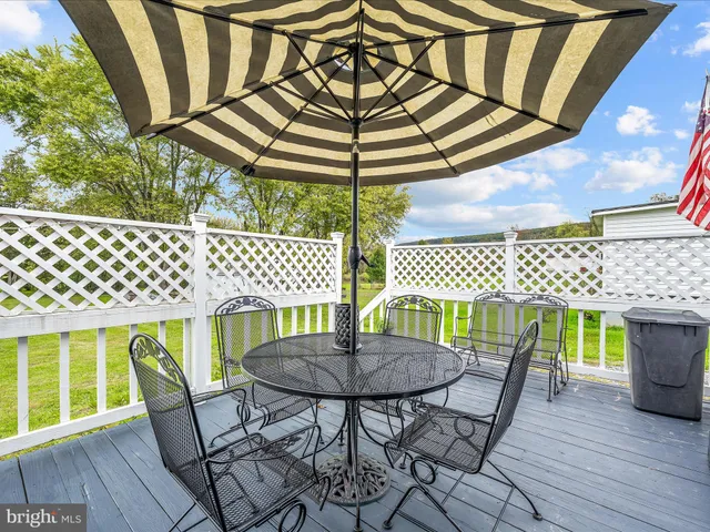 a fire hydrant in the middle of a field