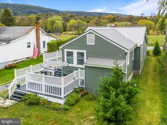 a view of a house with a swimming pool