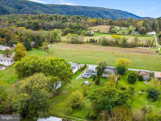 a view of swimming pool with a yard