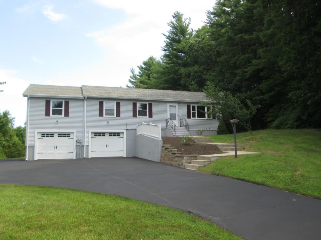 96 Rixtown Road Griswold, CT 06351 - Photo 1 of 1 a house view with a garden space