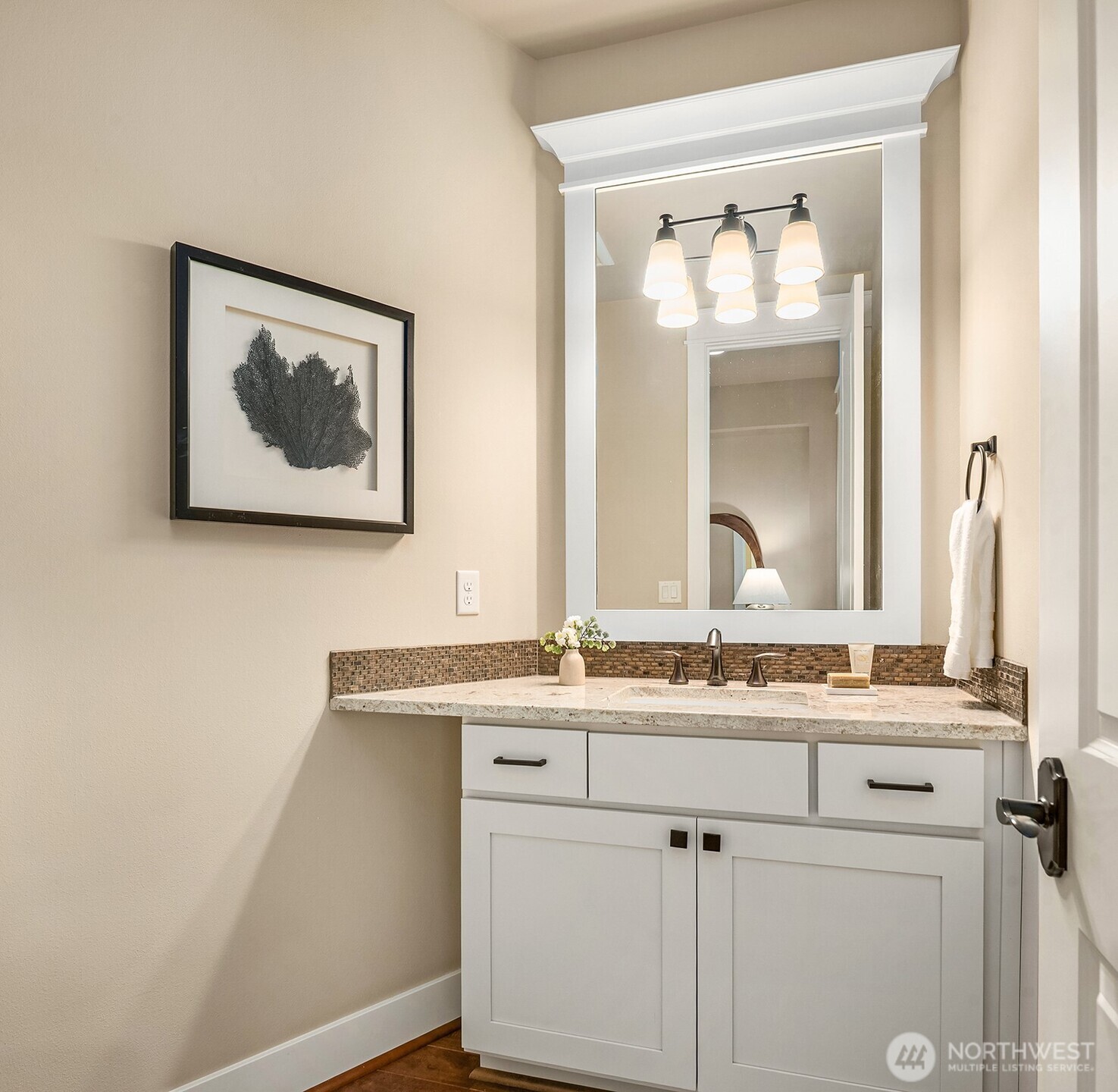 632 Southwest 185th Street Normandy Park, WA 98166 - Photo 14 of 39 a bathroom with a sink and a mirror