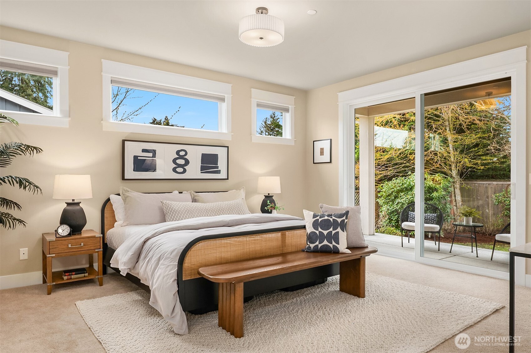 632 Southwest 185th Street Normandy Park, WA 98166 - Photo 15 of 39 a bedroom with a bed and a large window