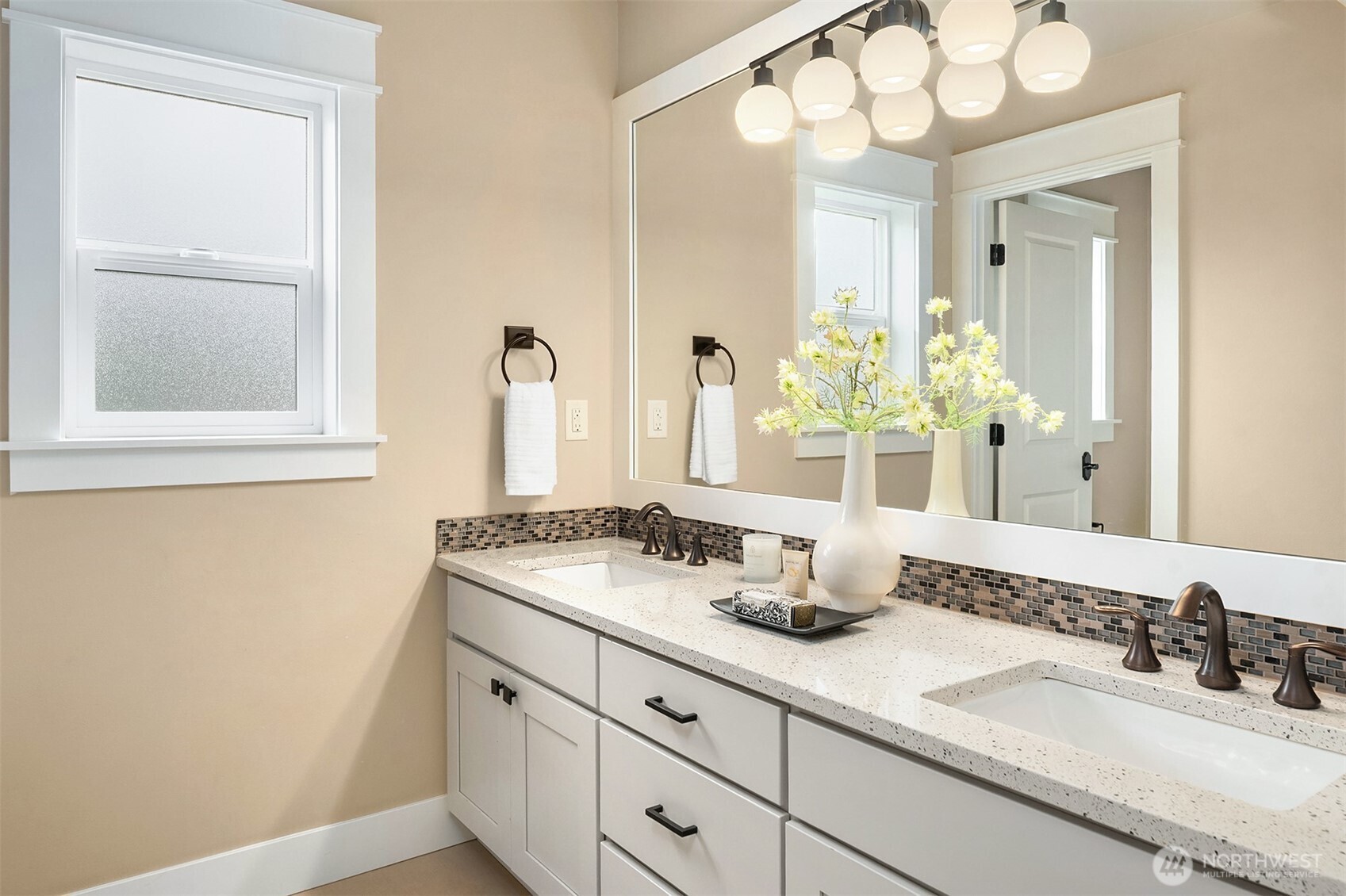 632 Southwest 185th Street Normandy Park, WA 98166 - Photo 26 of 39 a bathroom with a double vanity sink and a mirror