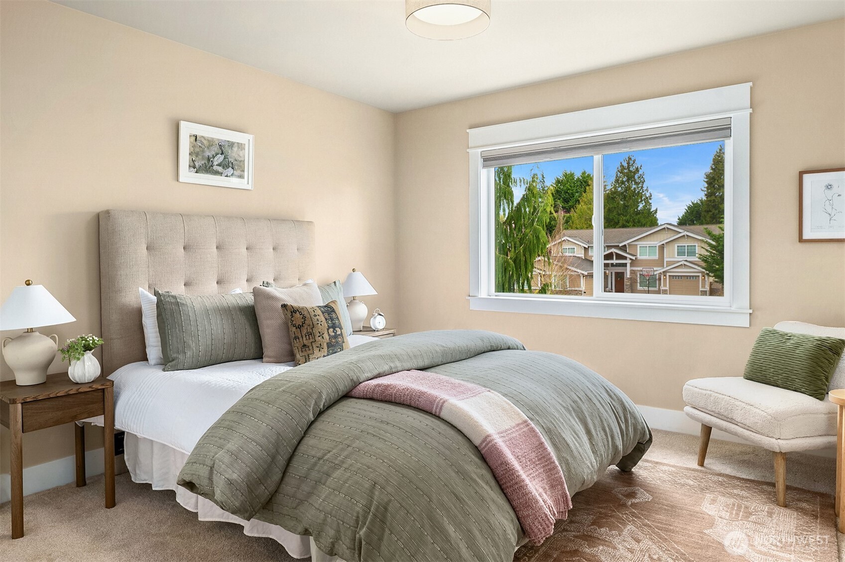 632 Southwest 185th Street Normandy Park, WA 98166 - Photo 27 of 39 a bedroom with a bed and a large window