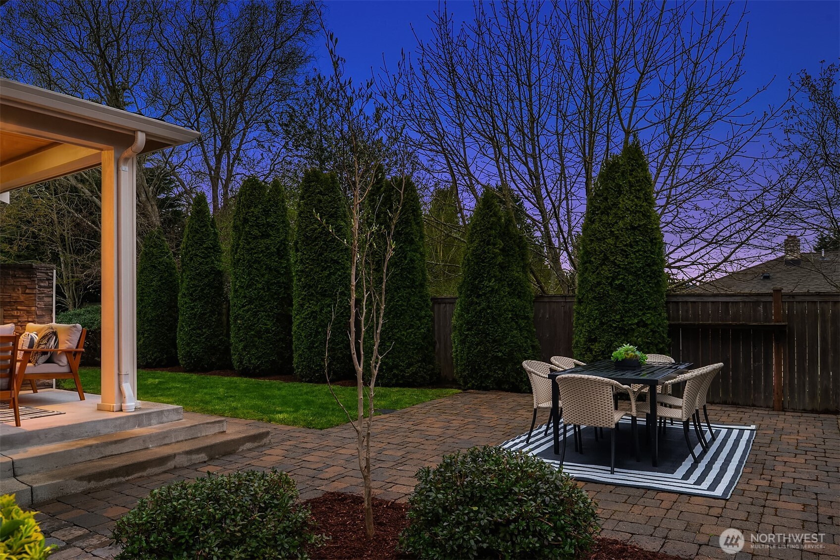 632 Southwest 185th Street Normandy Park, WA 98166 - Photo 32 of 39 a view of a patio with a table chairs and a fire pit