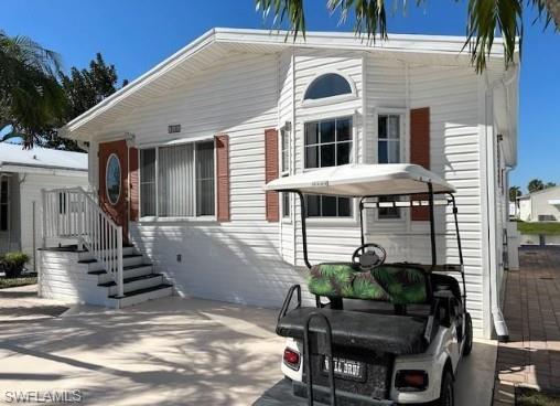 a front view of a house with patio