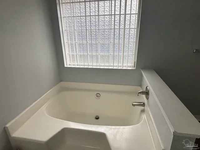 a bathroom with a bathtub