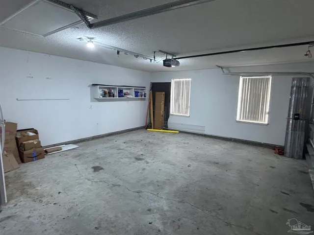 a view of a livingroom with natural light