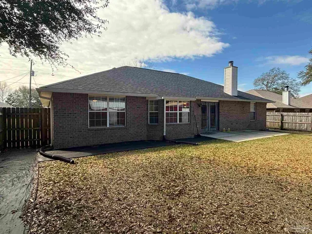 a house view with a garden space