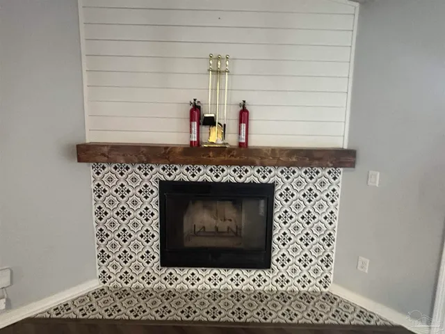 a living room with a fireplace