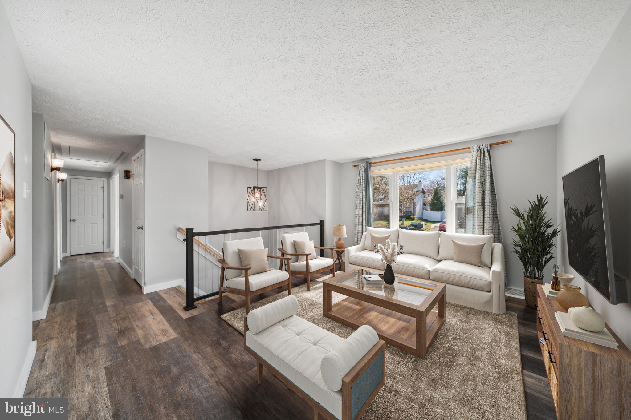 1335 Orchard Way Frederick, MD 21703 - Photo 15 of 42 a living room with furniture and a flat screen tv