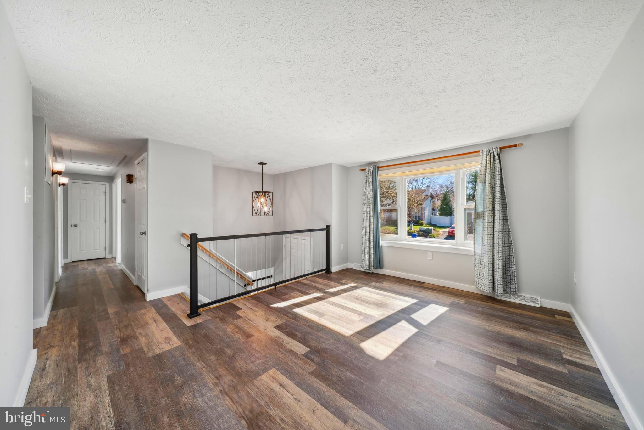 1335 Orchard Way Frederick, MD 21703 - Photo 16 of 42 a view of a room with window and hardwood floor