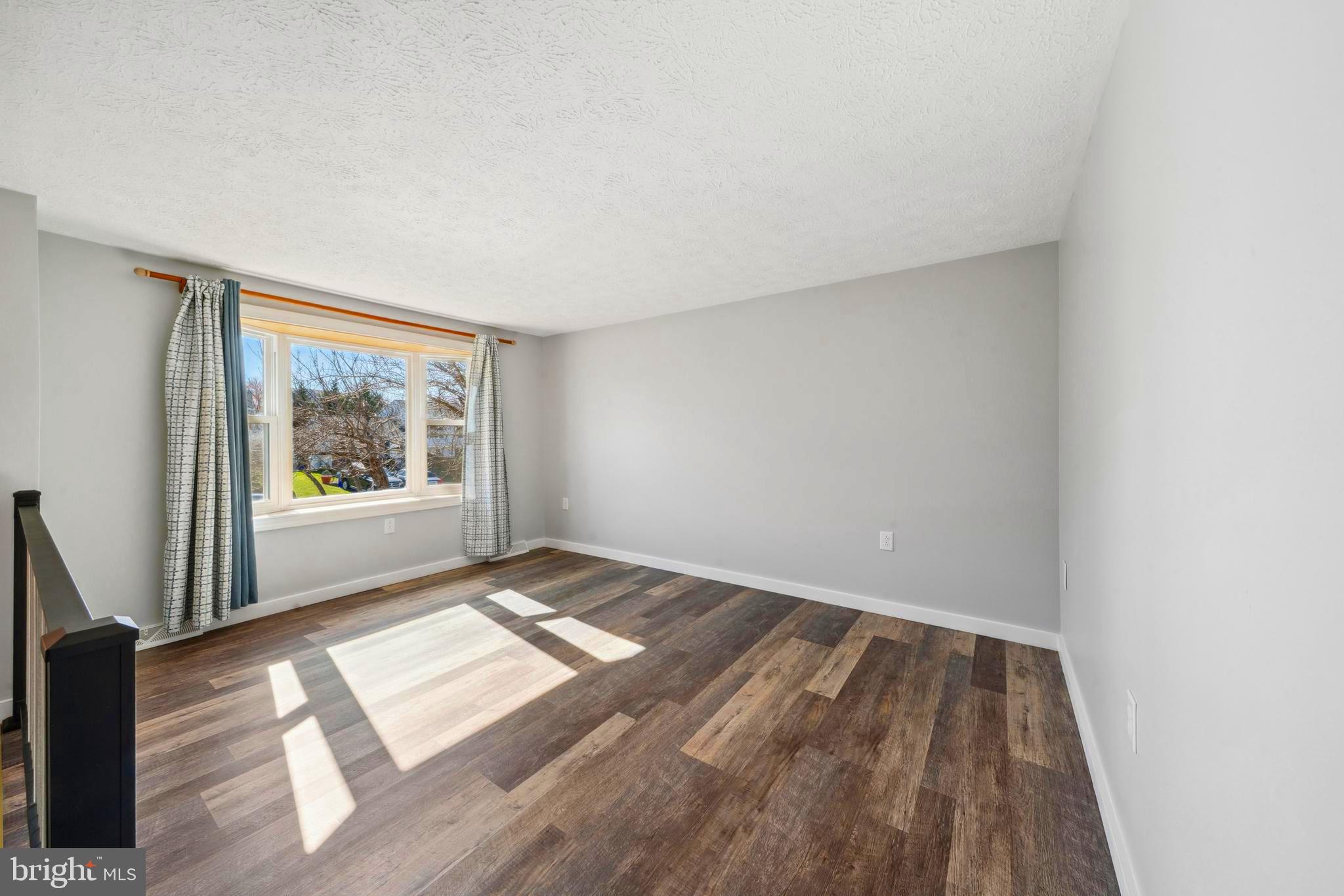 1335 Orchard Way Frederick, MD 21703 - Photo 18 of 42 a view of an empty room and window