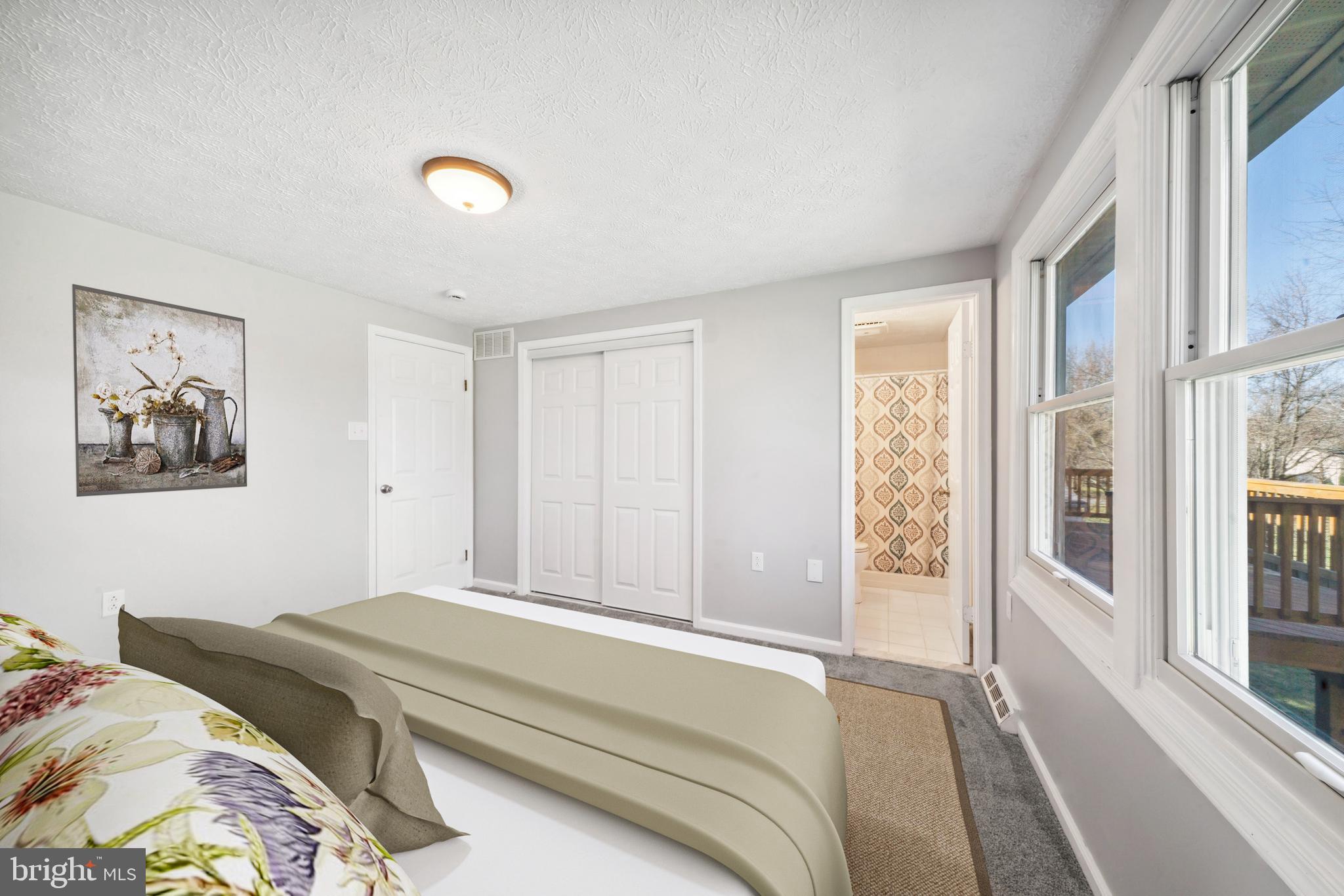 1335 Orchard Way Frederick, MD 21703 - Photo 20 of 42 a bedroom with a bed and a window