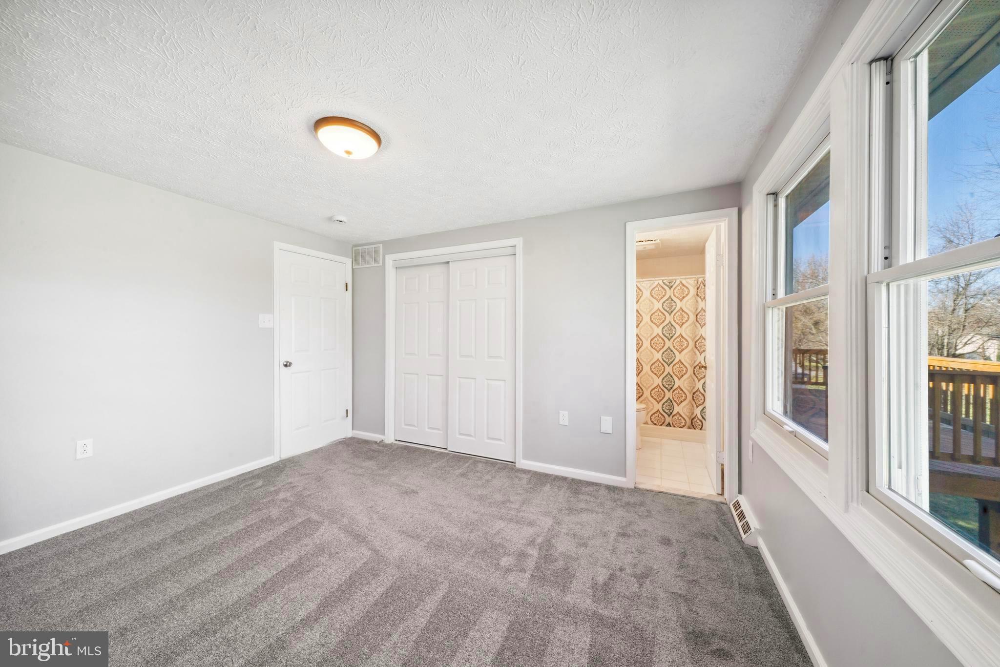1335 Orchard Way Frederick, MD 21703 - Photo 21 of 42 a view of an empty room with a window