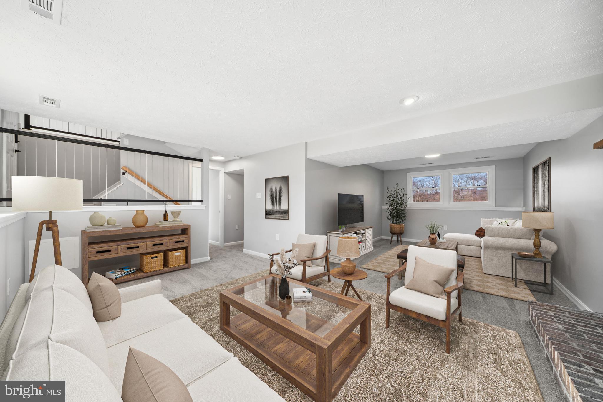 1335 Orchard Way Frederick, MD 21703 - Photo 27 of 42 a living room with furniture and a flat screen tv