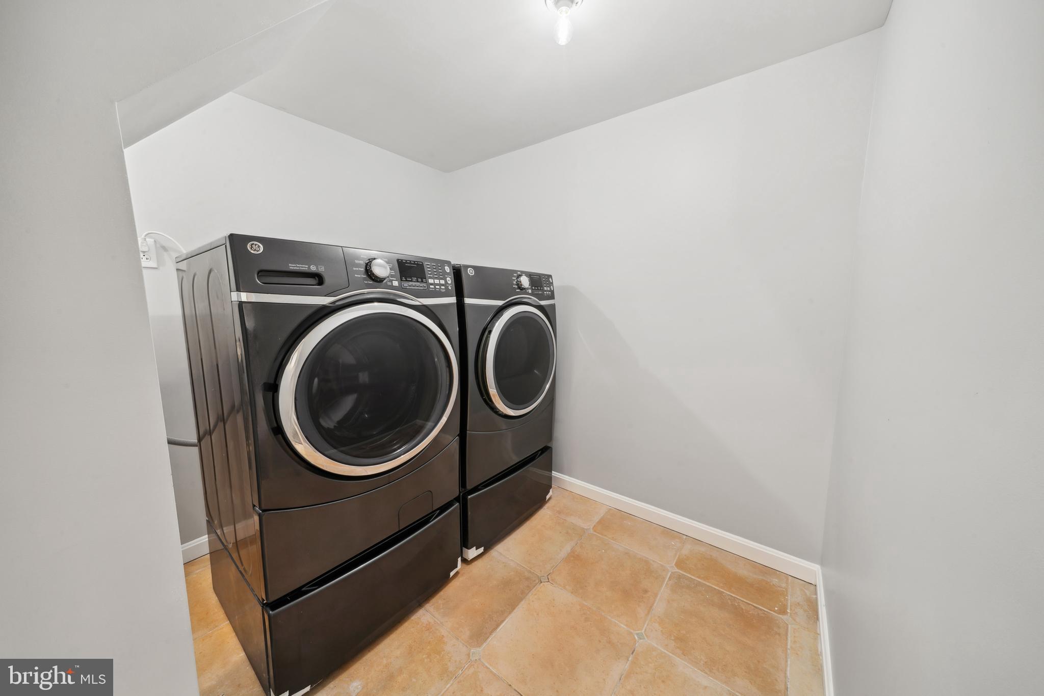 1335 Orchard Way Frederick, MD 21703 - Photo 34 of 42 a utility room with dryer and washer