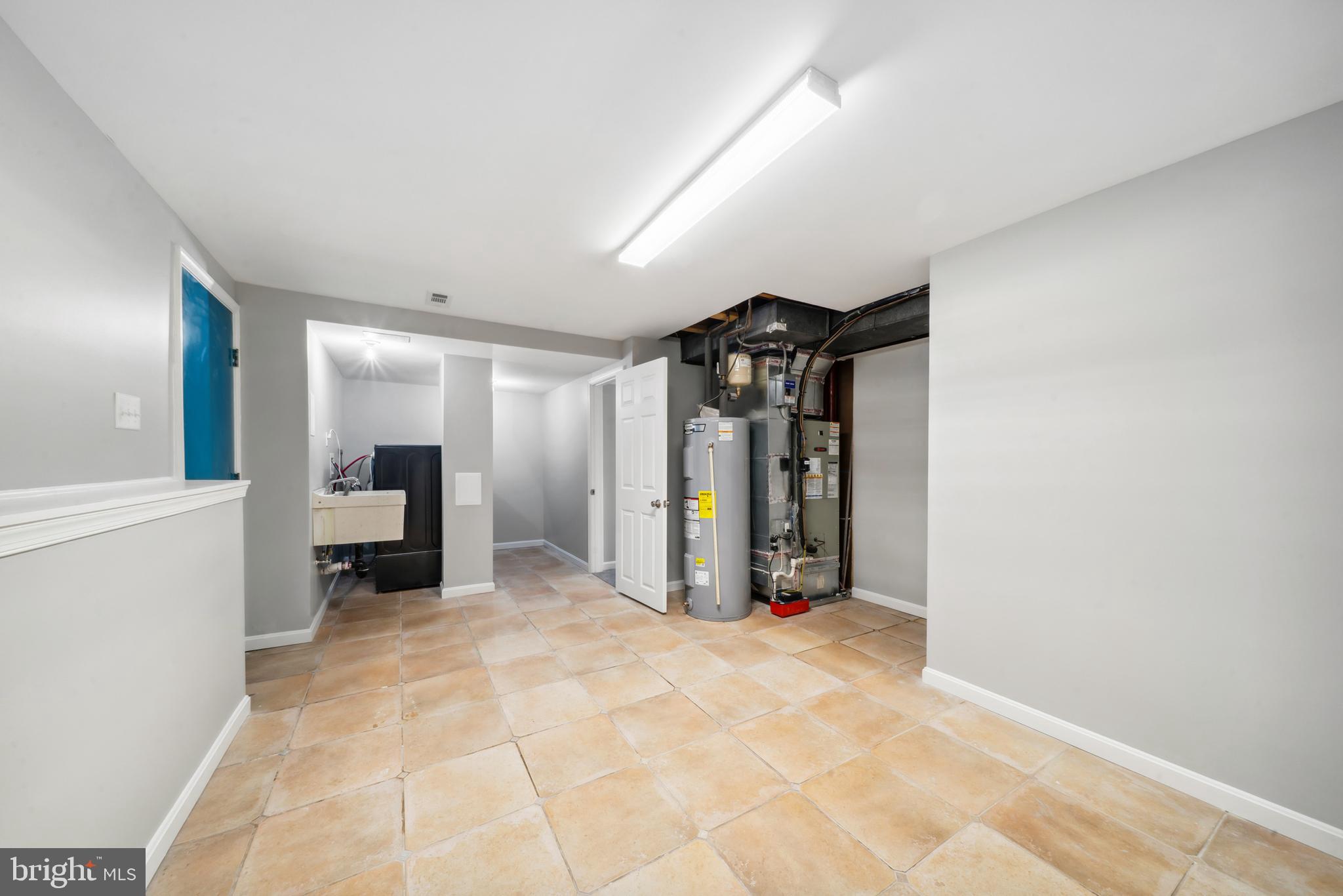 1335 Orchard Way Frederick, MD 21703 - Photo 36 of 42 a view of a hallway with wooden shelves