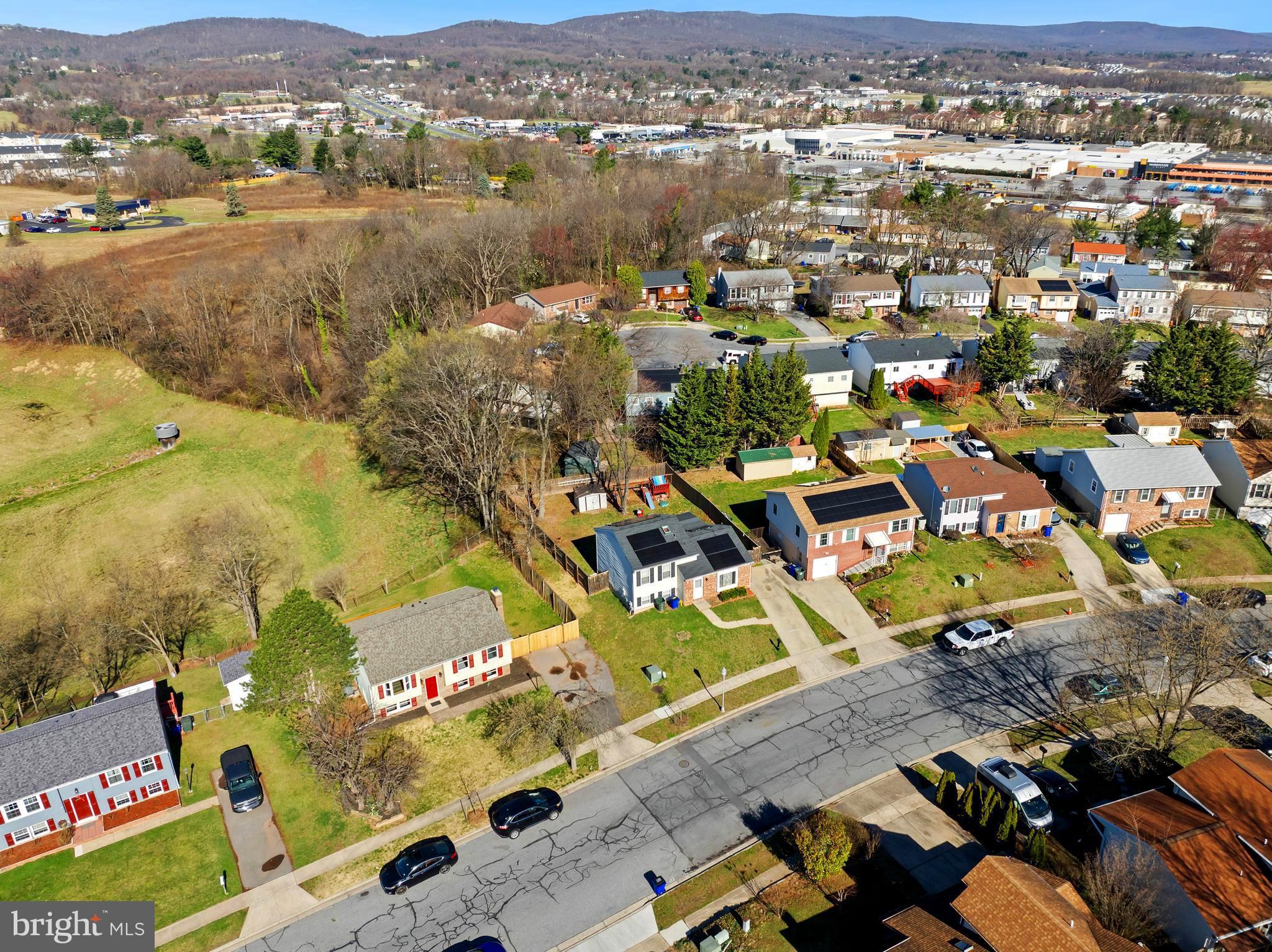 1335 Orchard Way Frederick, MD 21703 - Photo 39 of 42 an aerial view of residential houses with outdoor space