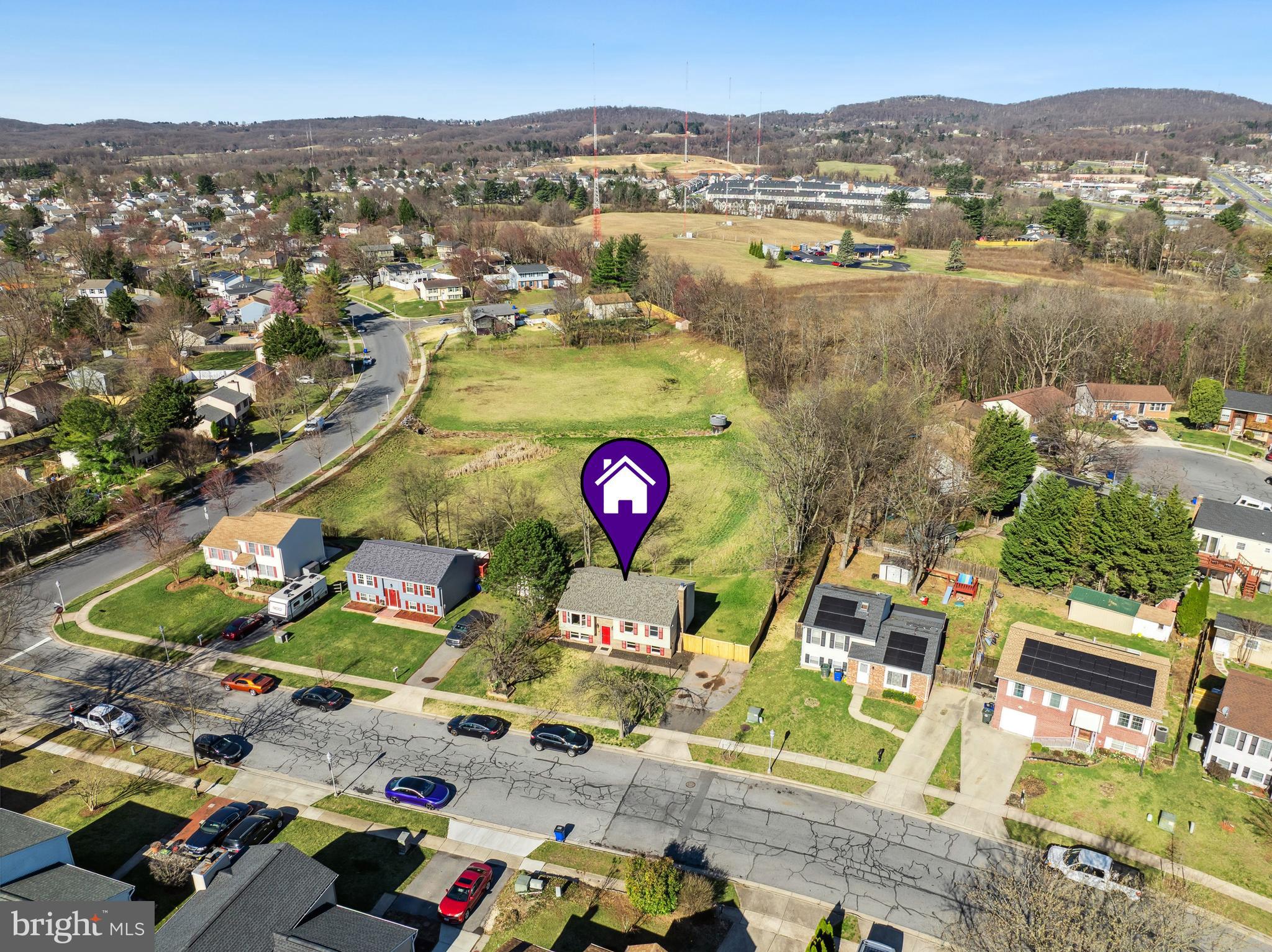 1335 Orchard Way Frederick, MD 21703 - Photo 40 of 42 an aerial view of residential houses with outdoor space and seating