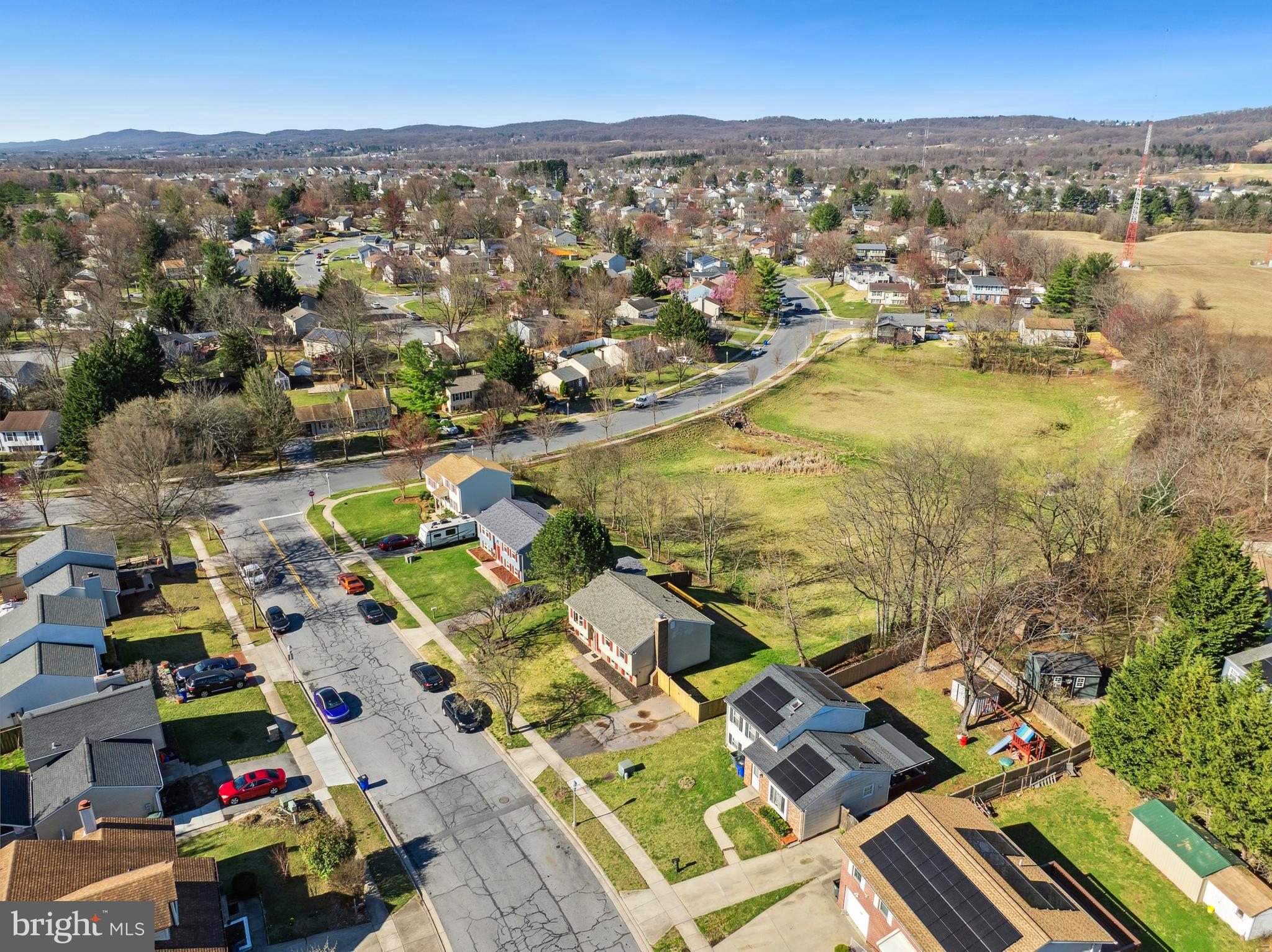 1335 Orchard Way Frederick, MD 21703 - Photo 41 of 42 an aerial view of residential houses with outdoor space