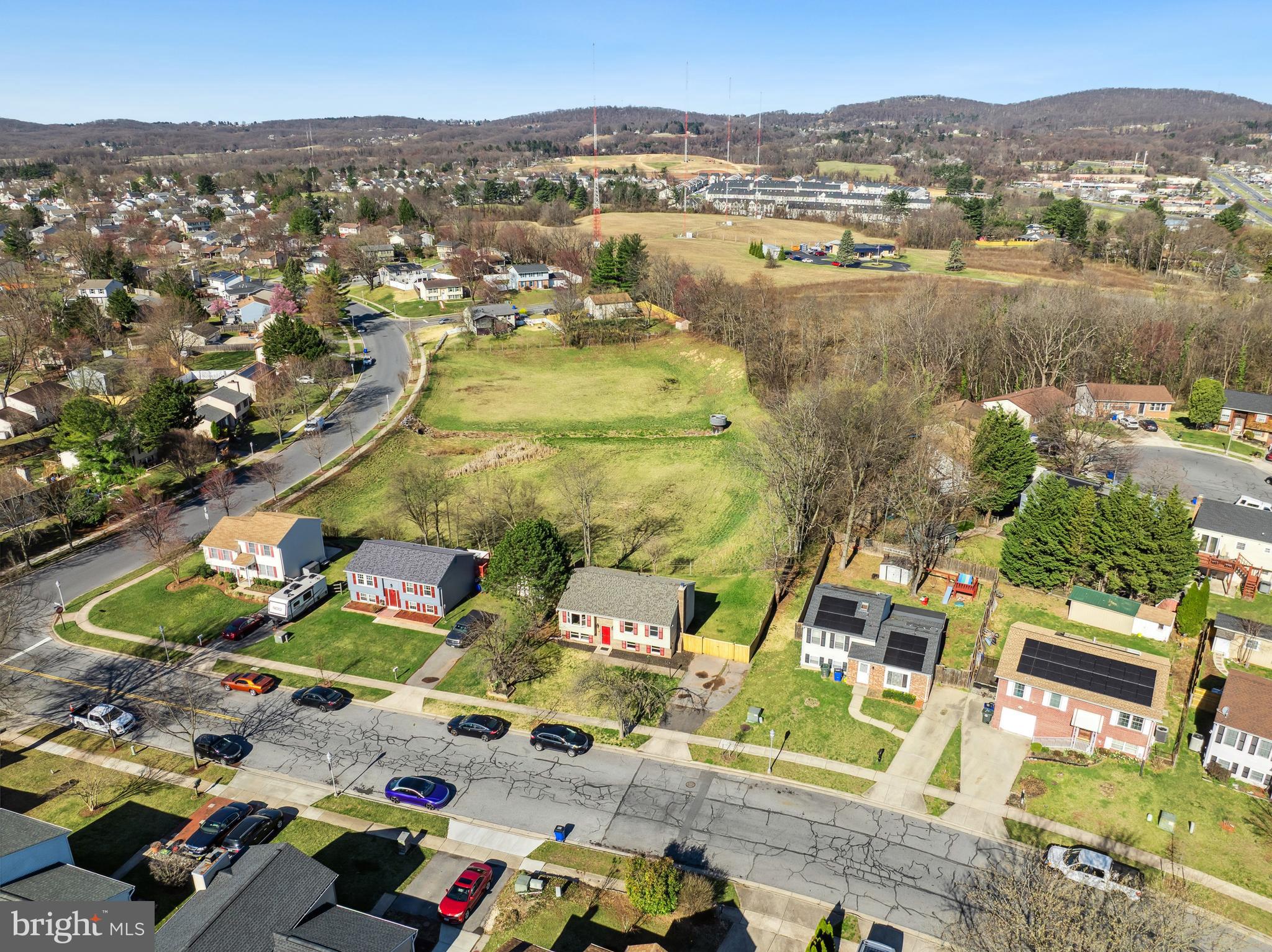 1335 Orchard Way Frederick, MD 21703 - Photo 5 of 42 an aerial view of residential houses with outdoor space