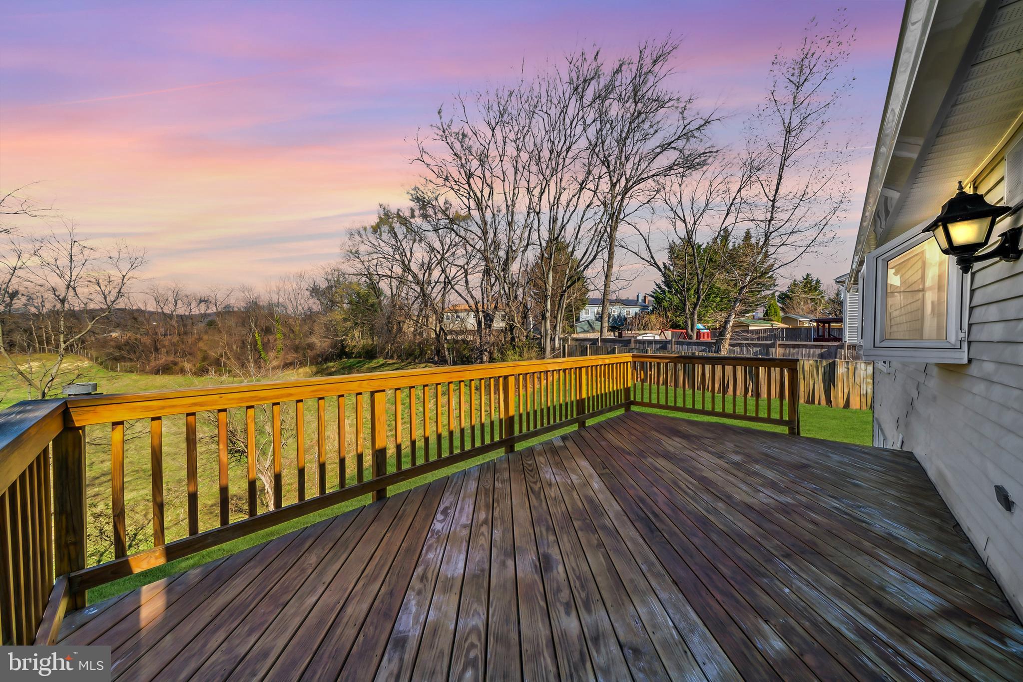 1335 Orchard Way Frederick, MD 21703 - Photo 6 of 42 a view of wooden deck with a garden