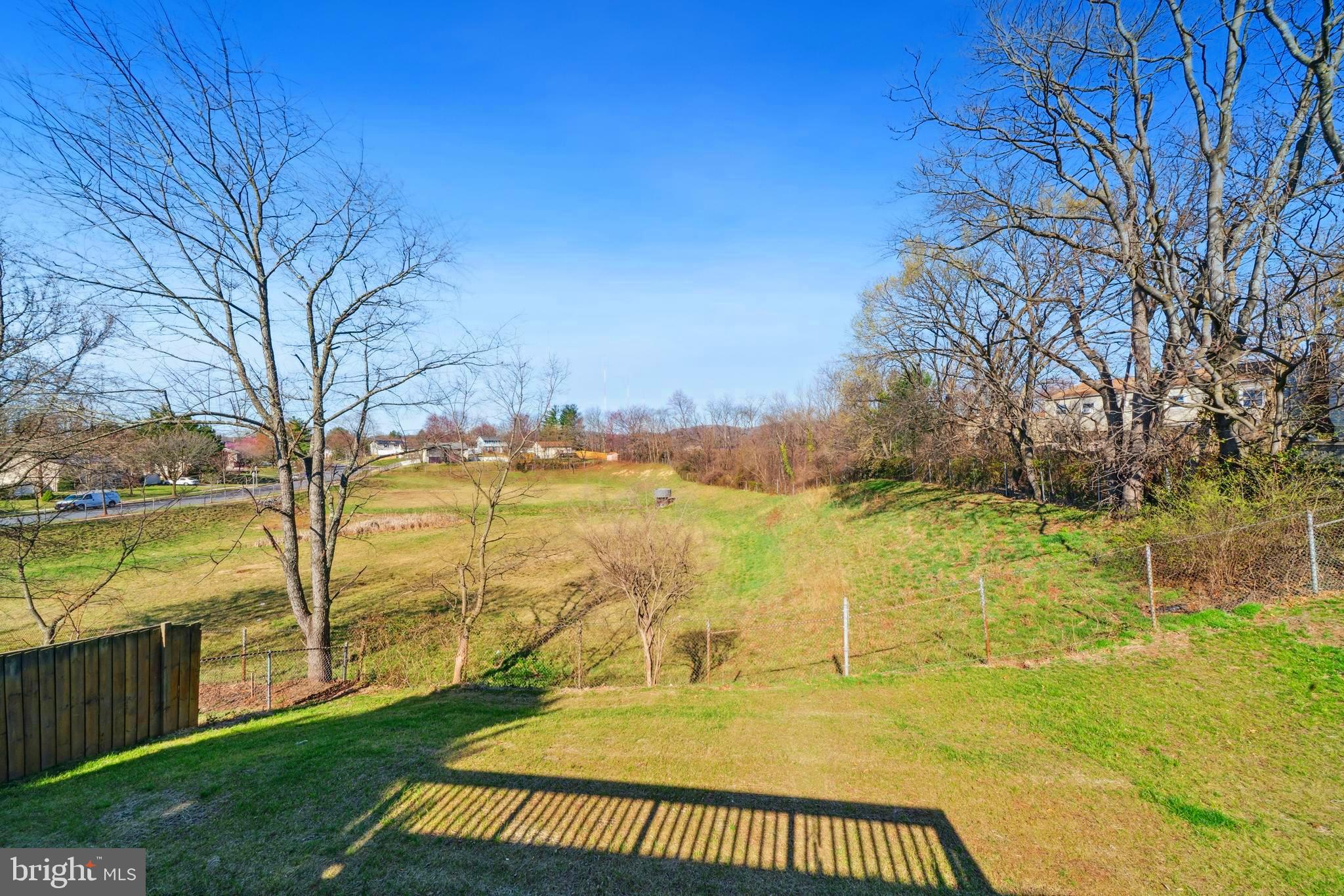 1335 Orchard Way Frederick, MD 21703 - Photo 8 of 42 a view of a lake with a yard