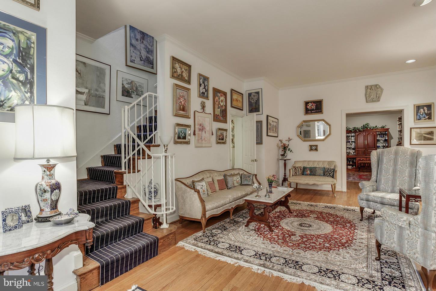 2523 P Street Northwest Washington, DC 20007 - Photo 2 of 14 a living room with furniture and wooden floor