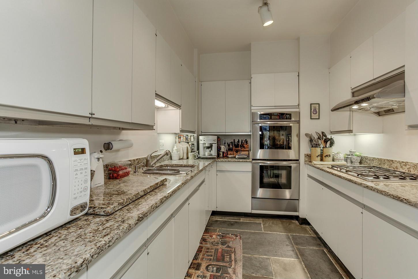 2523 P Street Northwest Washington, DC 20007 - Photo 6 of 14 a kitchen with refrigerator and stove