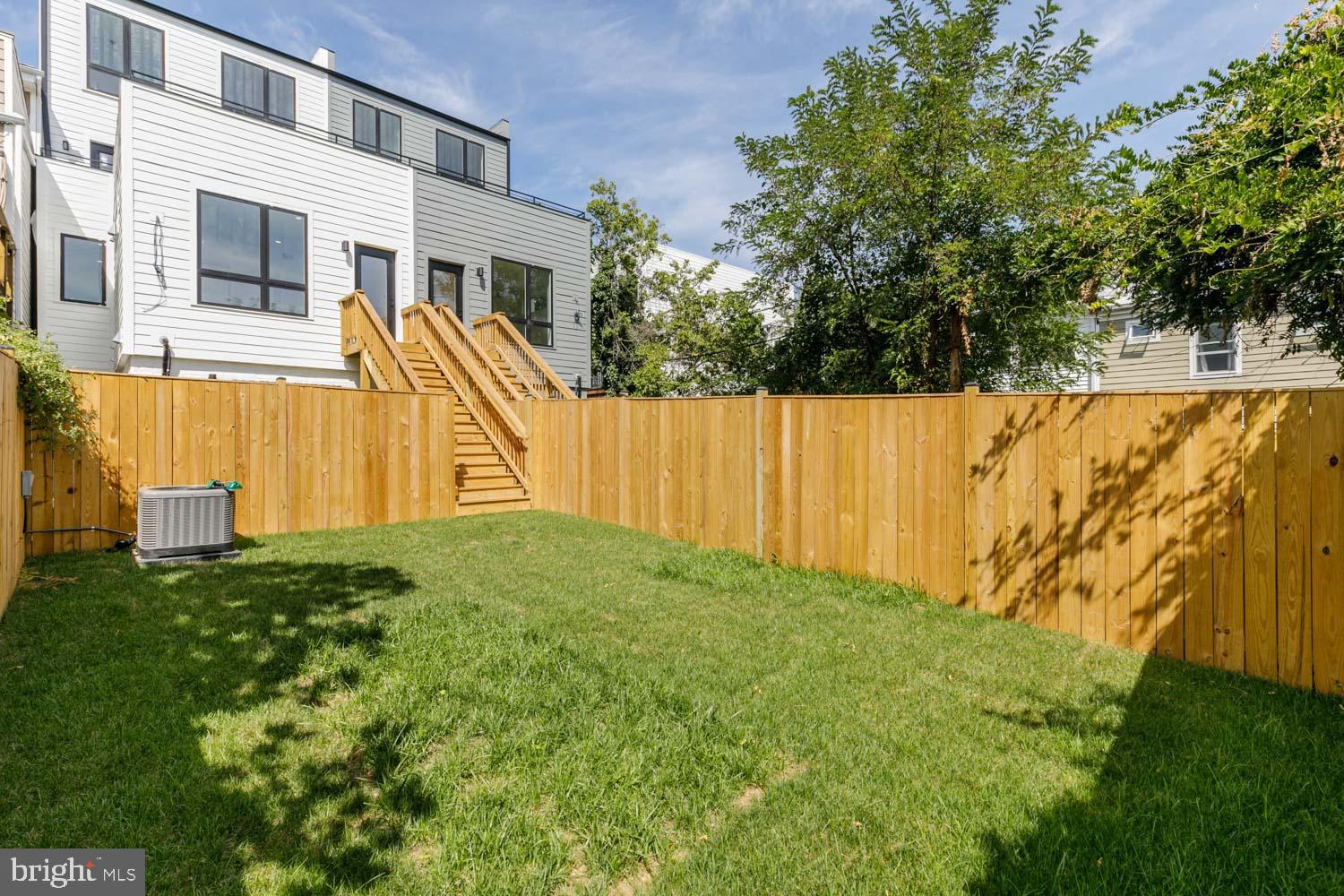 428 Manor Place Northwest, Unit A Washington, DC 20010 - Photo 2 of 21 a view of a house with a yard