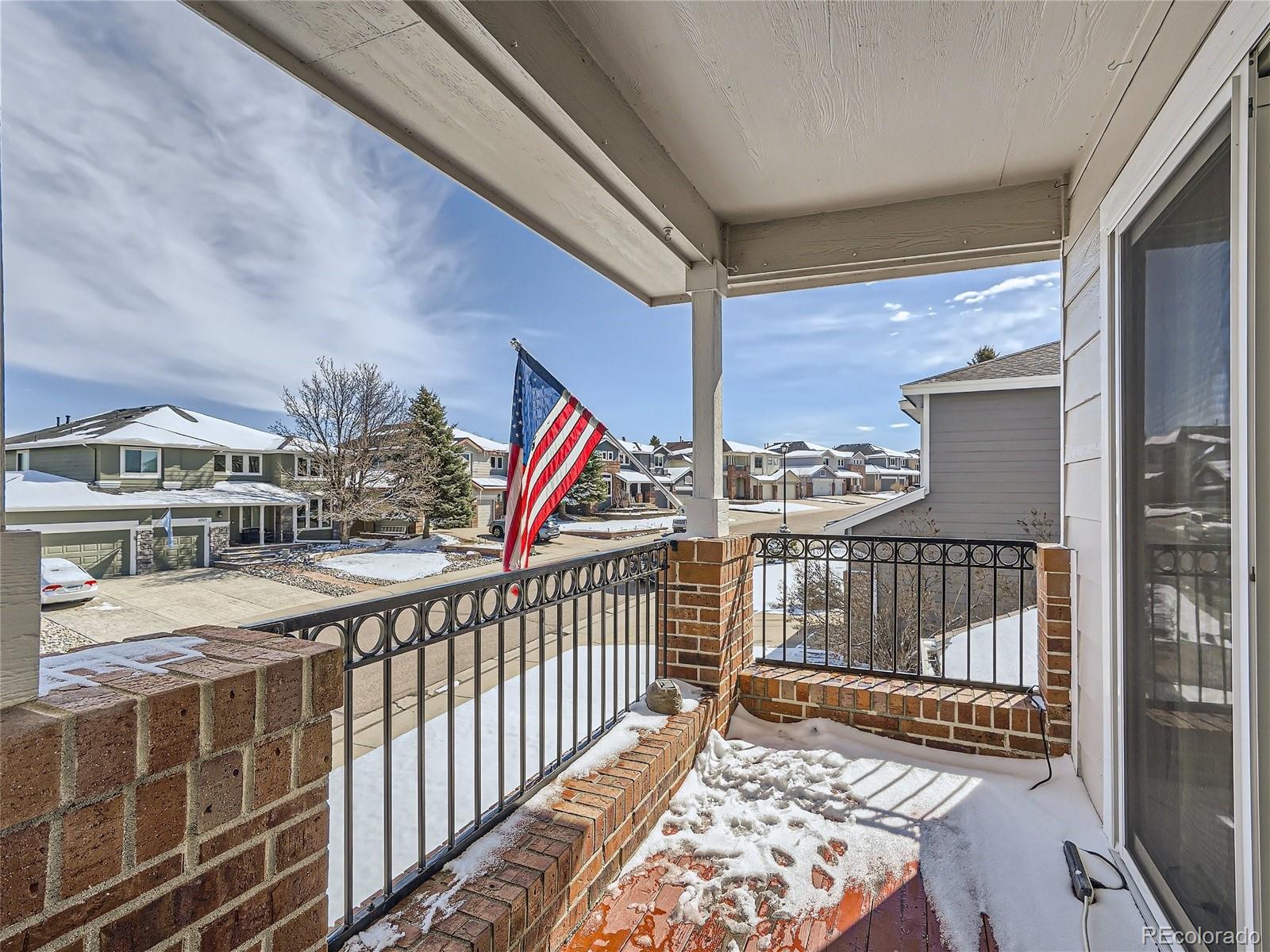 6596 Millstone Street Highlands Ranch, CO 80130 - Photo 27 of 33 a view of city from a balcony