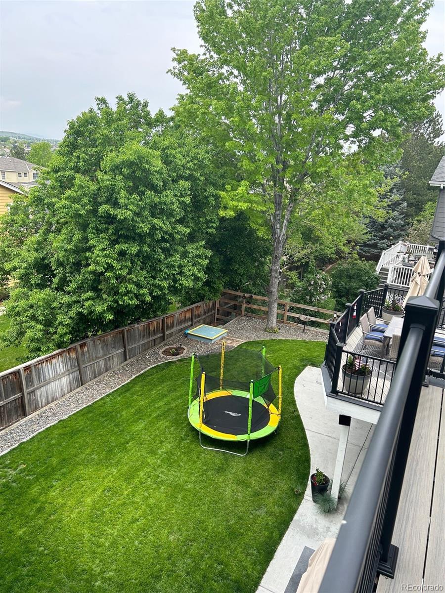 6596 Millstone Street Highlands Ranch, CO 80130 - Photo 30 of 33 a view of a garden with furniture