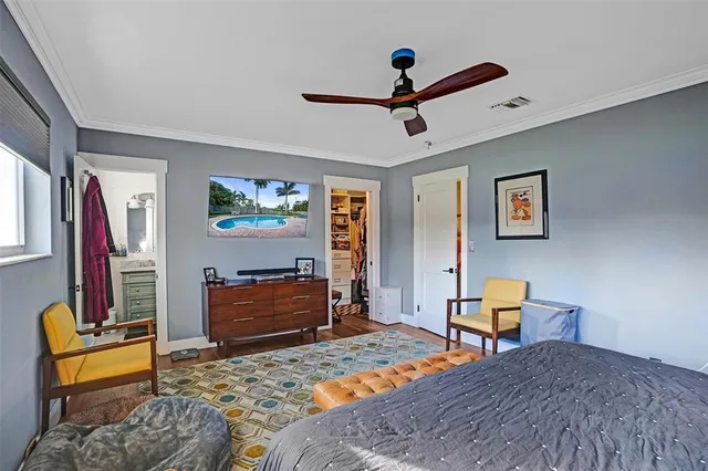 a bedroom with a bed and furniture