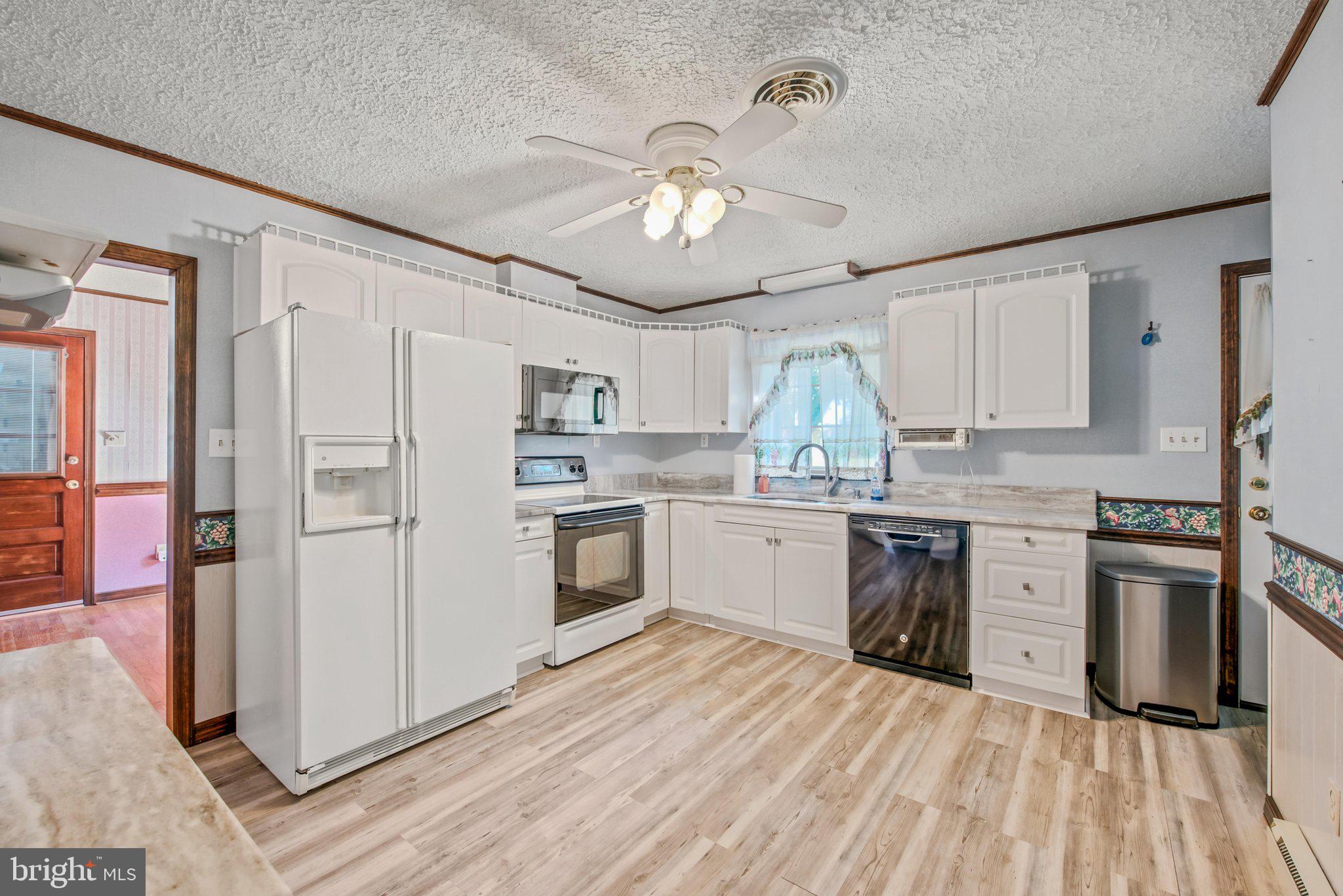 3203 Charles Town Road Kearneysville, WV 25430 - Photo 10 of 45 cabinets, ceiling fan light fixture, and