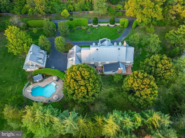 an outdoor space with furniture and umbrella